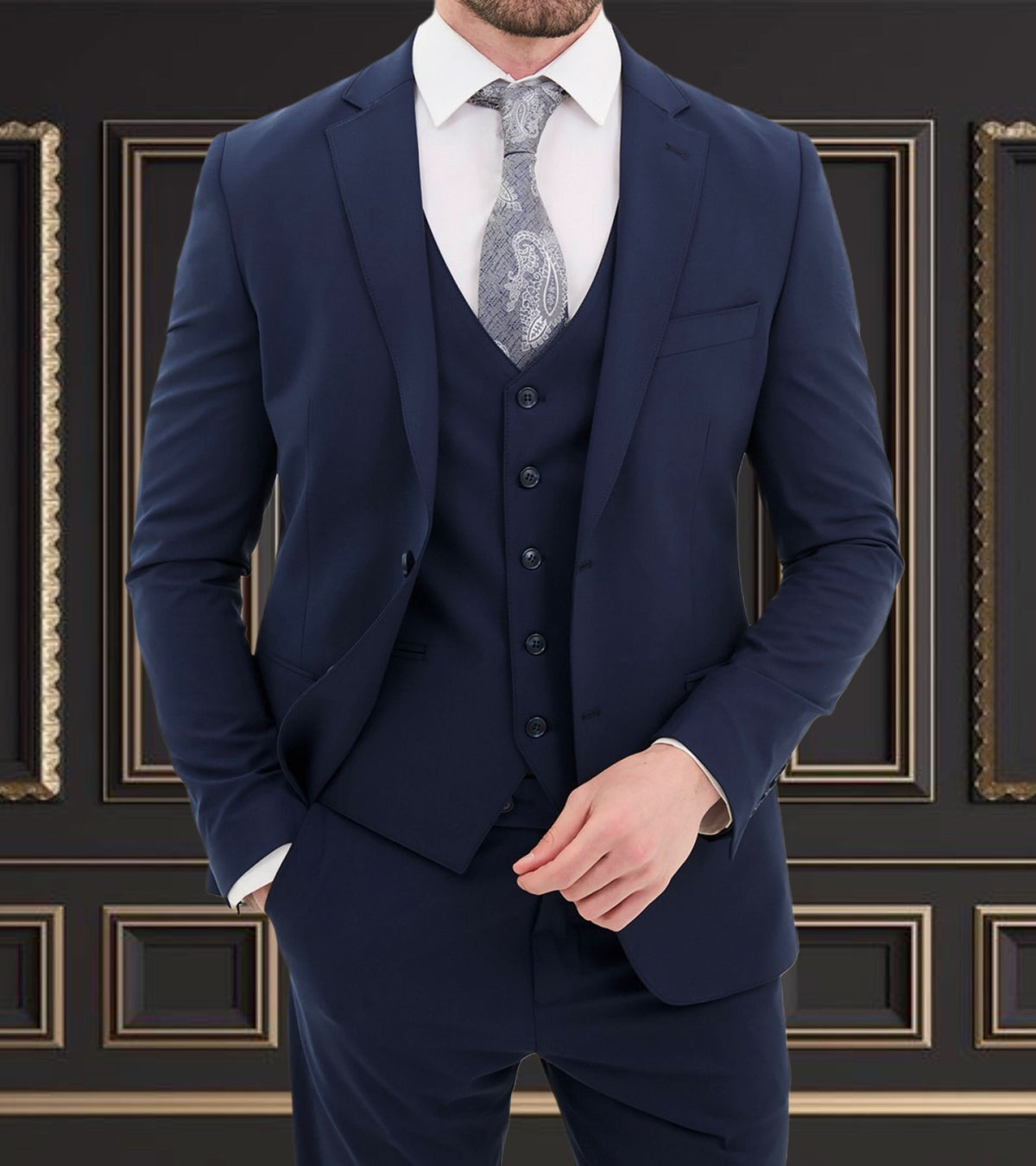 Dark blue 3 piece slim fit suit with a vest, blazer, and stylish tie, showcasing premium fabric.
