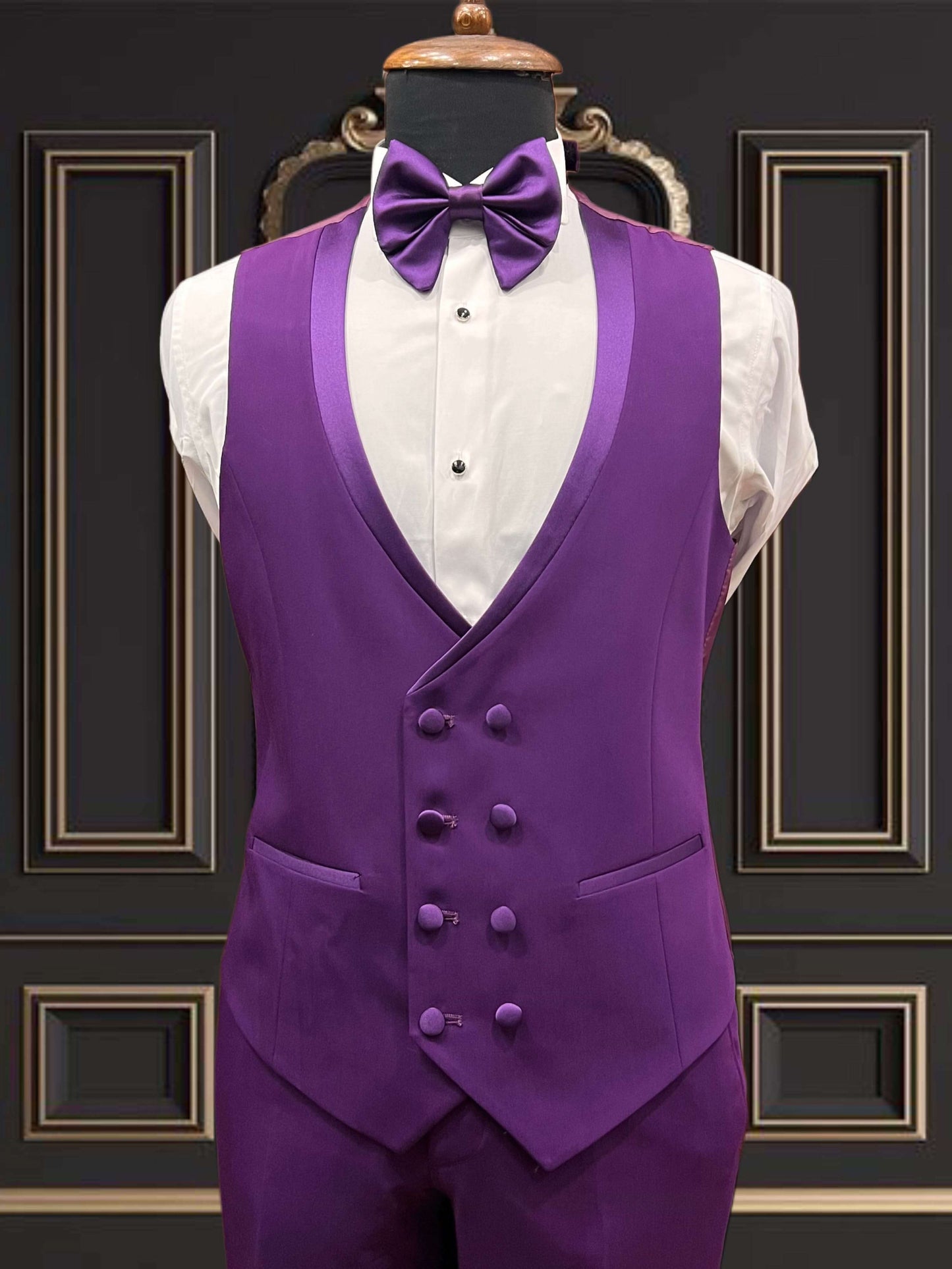 Men's purple tuxedo with shawl lapel and bow tie, perfect for weddings and special events.